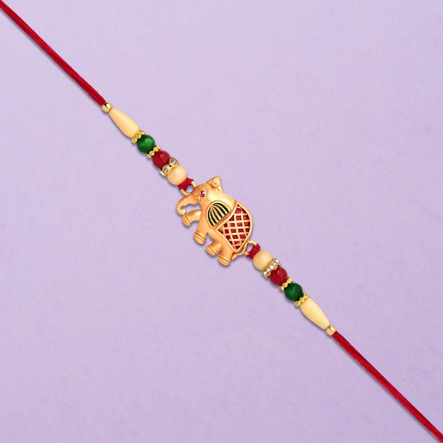 Golden Elephant Rakhi With Red Green Moti - warehousetech13