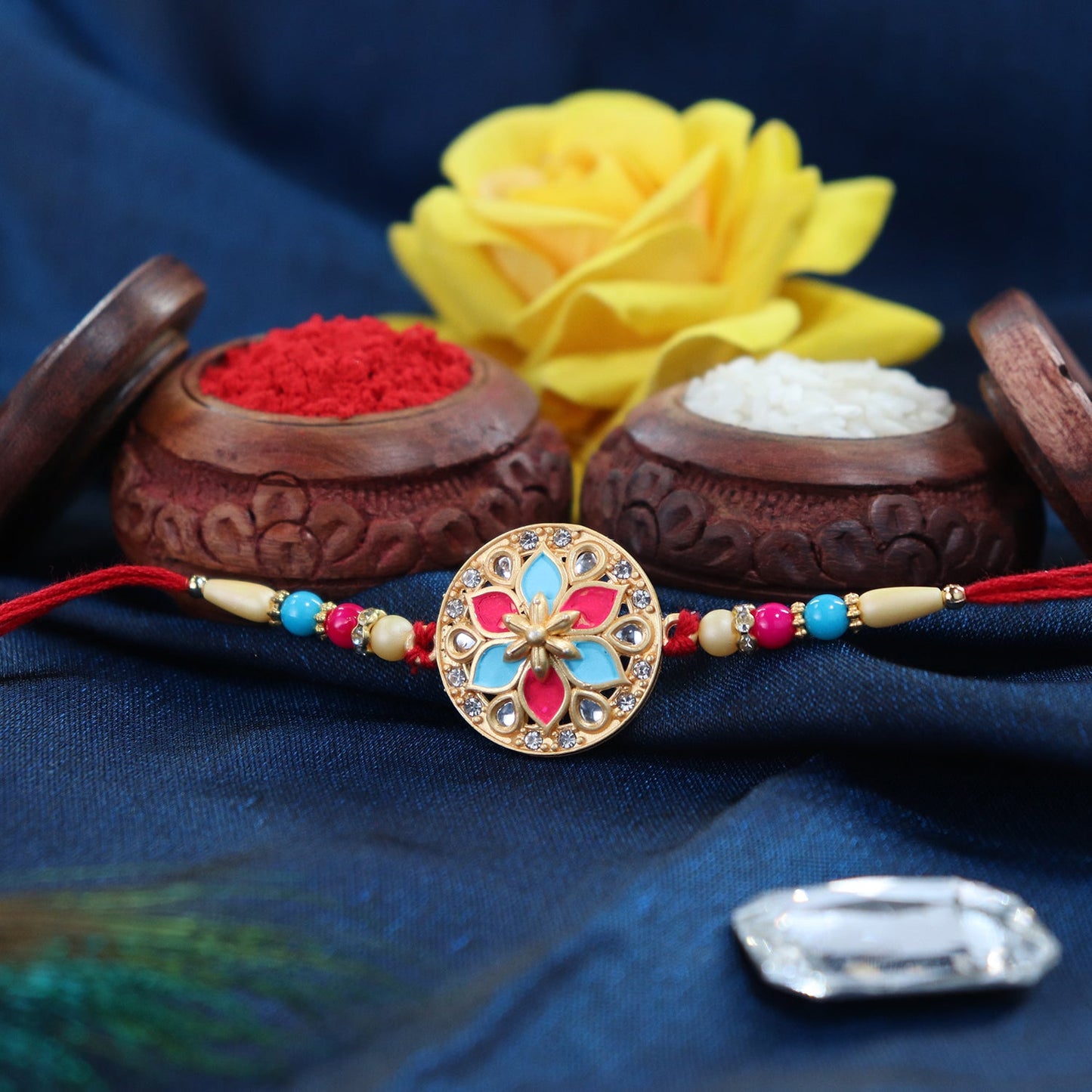Round Floral Rakhi With Pink-blue Enamel And Beaded Thread - warehousetech13