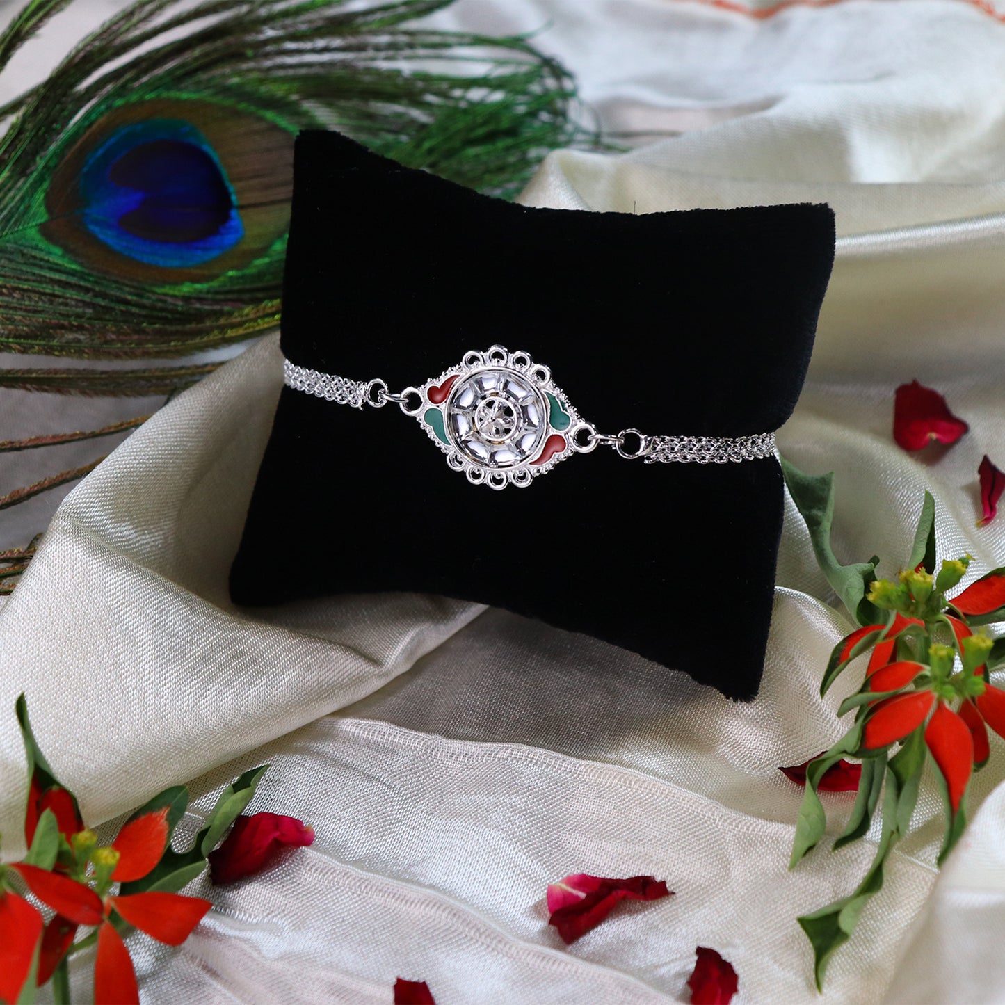 Stylish Rakhi With Intricate Floral Motif And Enamel Touches - warehousetech13