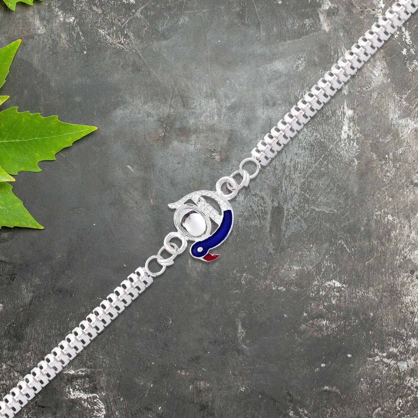 Elegant Peacock Design Rakhi With Blue Enamel And Silver Metal Chain - warehousetech13