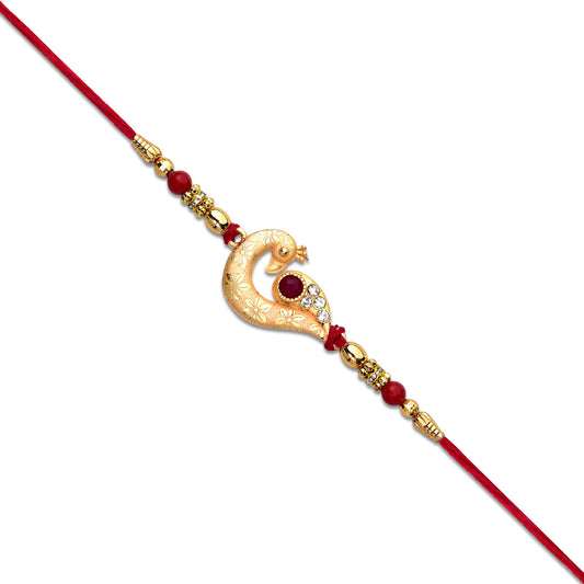 Golden Peacock Feather Rakhi With Red Thread And Kundan Detailing - warehousetech13