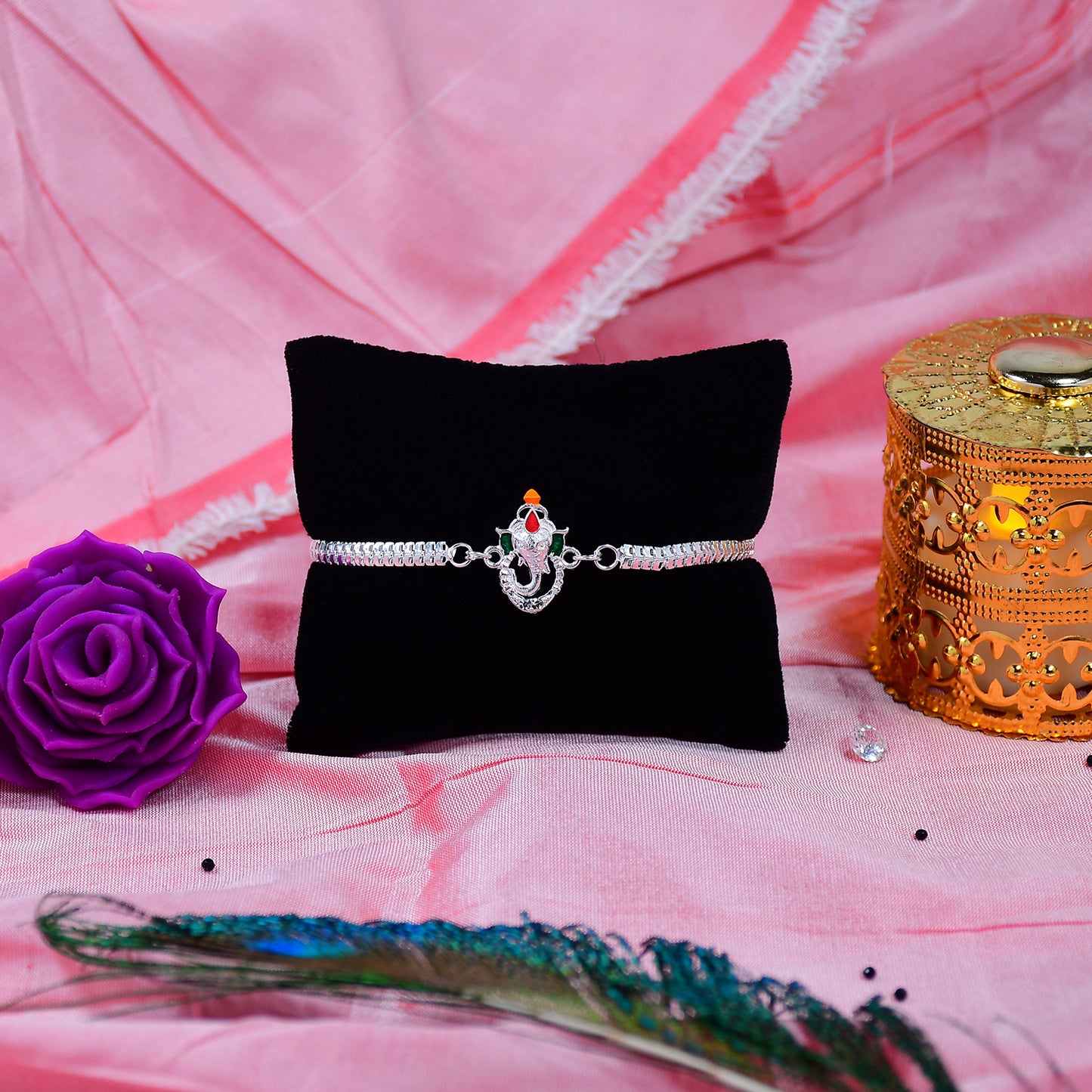 Stylish Ganesha Rakhi With Enamel Highlights And Silver Metal Chain - warehousetech13