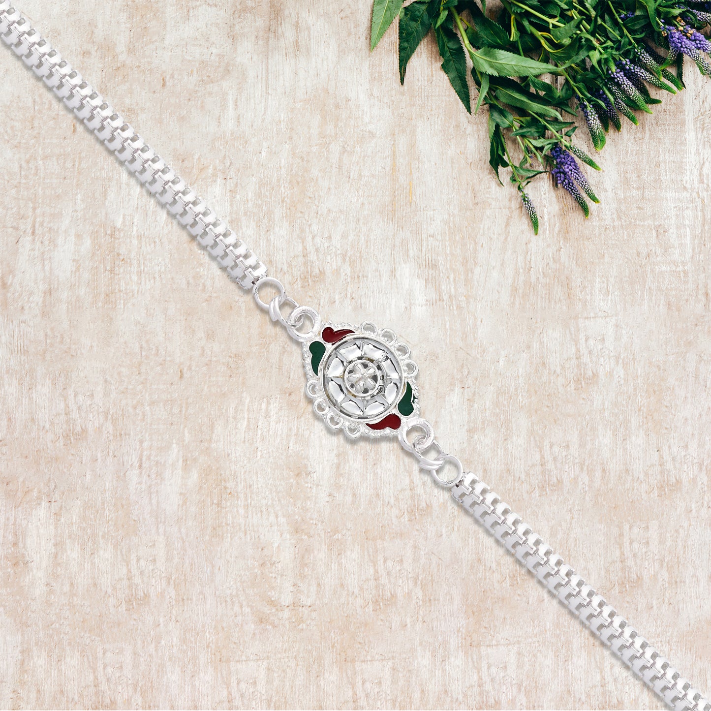 Stylish Rakhi With Intricate Floral Motif And Enamel Touches - warehousetech13