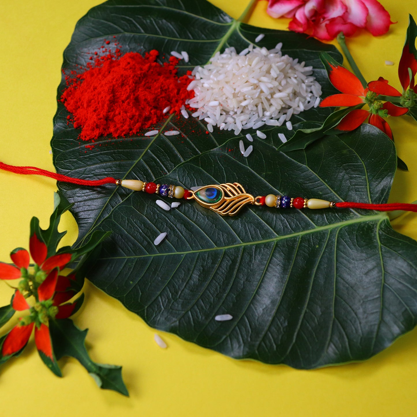 Peacock Feather Design Rakhi With Beaded Detailing And Red Thread - warehousetech13