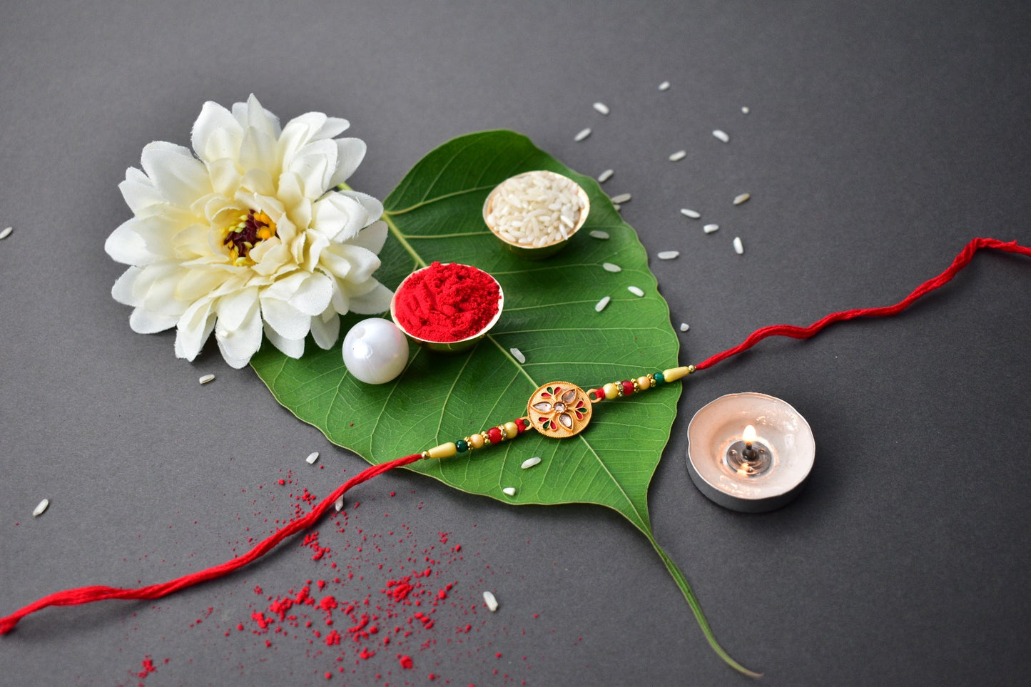 Sacred Kalash Design Rakhi With Embellished Beads And Red Thread - warehousetech13