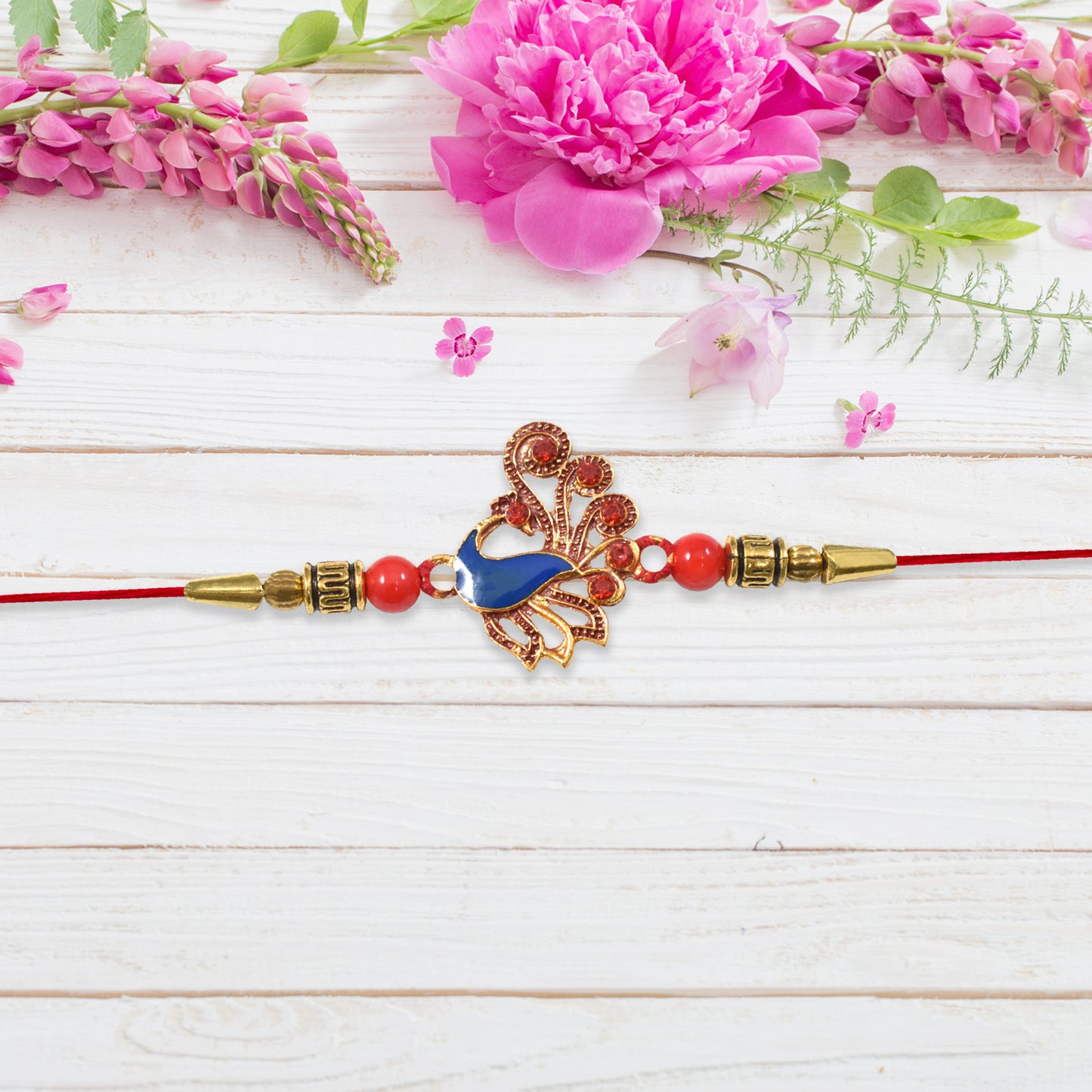 Ethnic Peacock Rakhi With Stone Detailing - warehousetech13