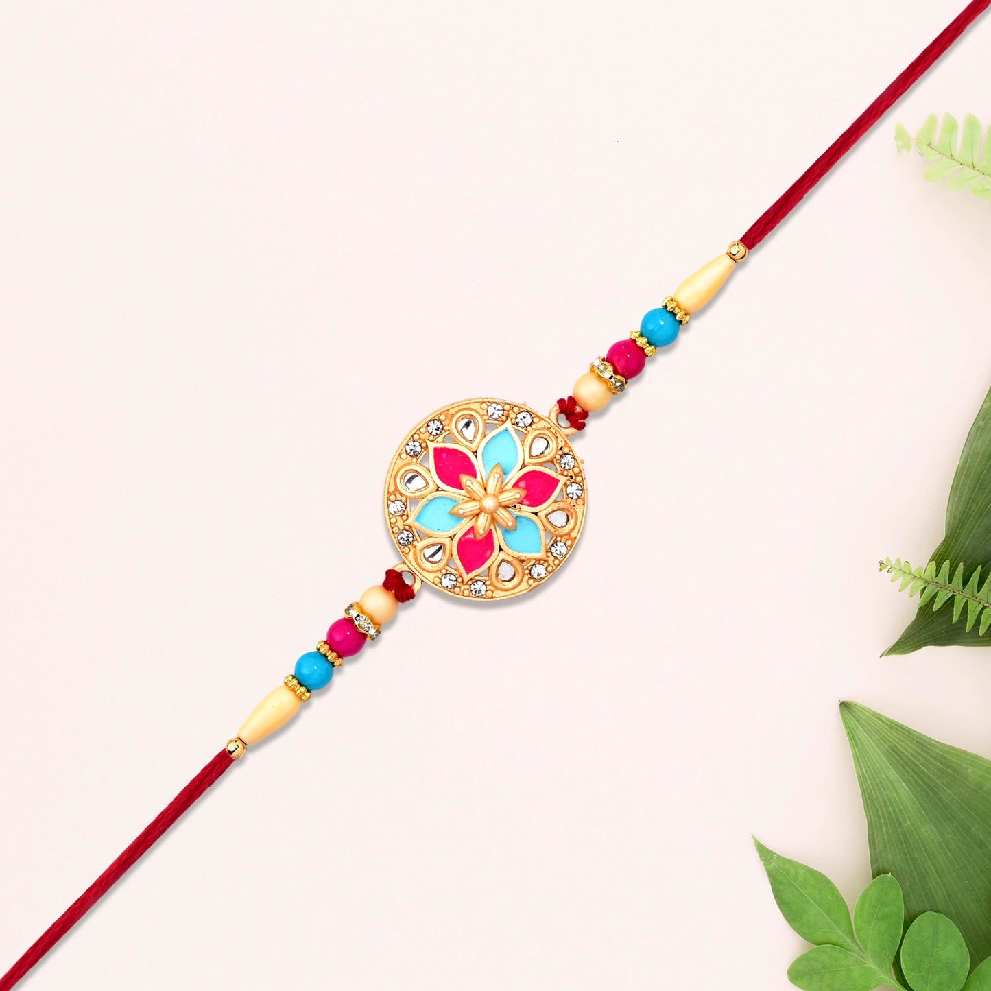 Round Floral Rakhi With Pink-blue Enamel And Beaded Thread - warehousetech13