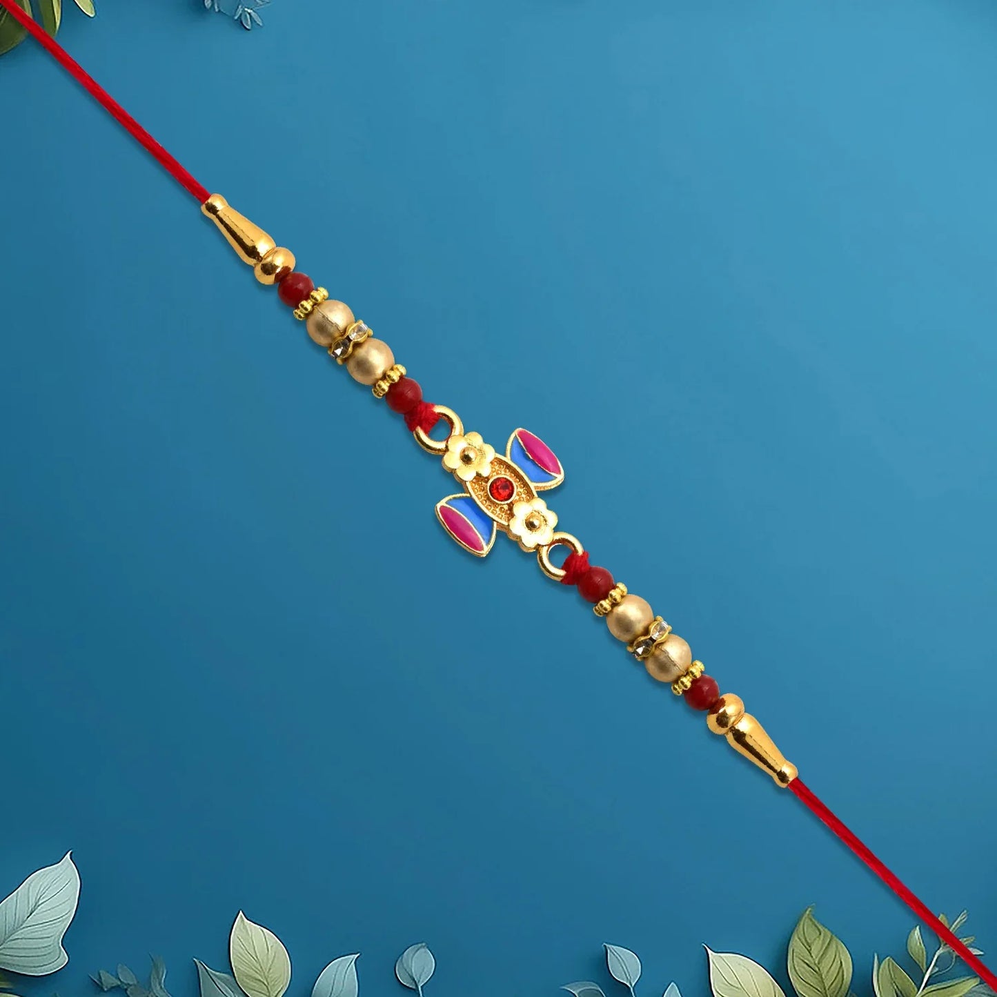 Damru Rakhi With Beads And Floral Detailing - warehousetech13