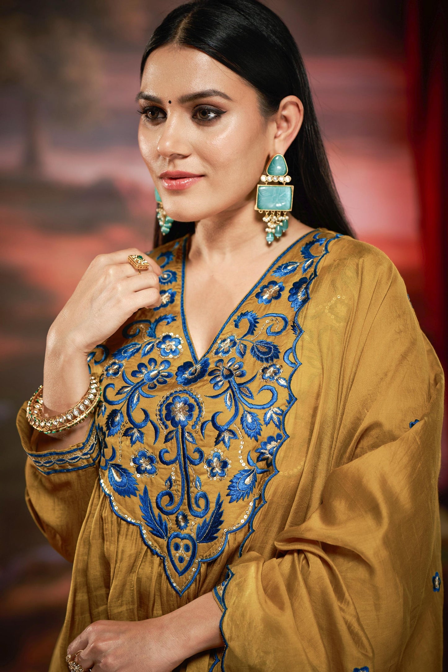 Raajvee Peacock Blue & Mustard Pure Silk Suit Set with Resham Zari Embroidery & Sequin Neckline