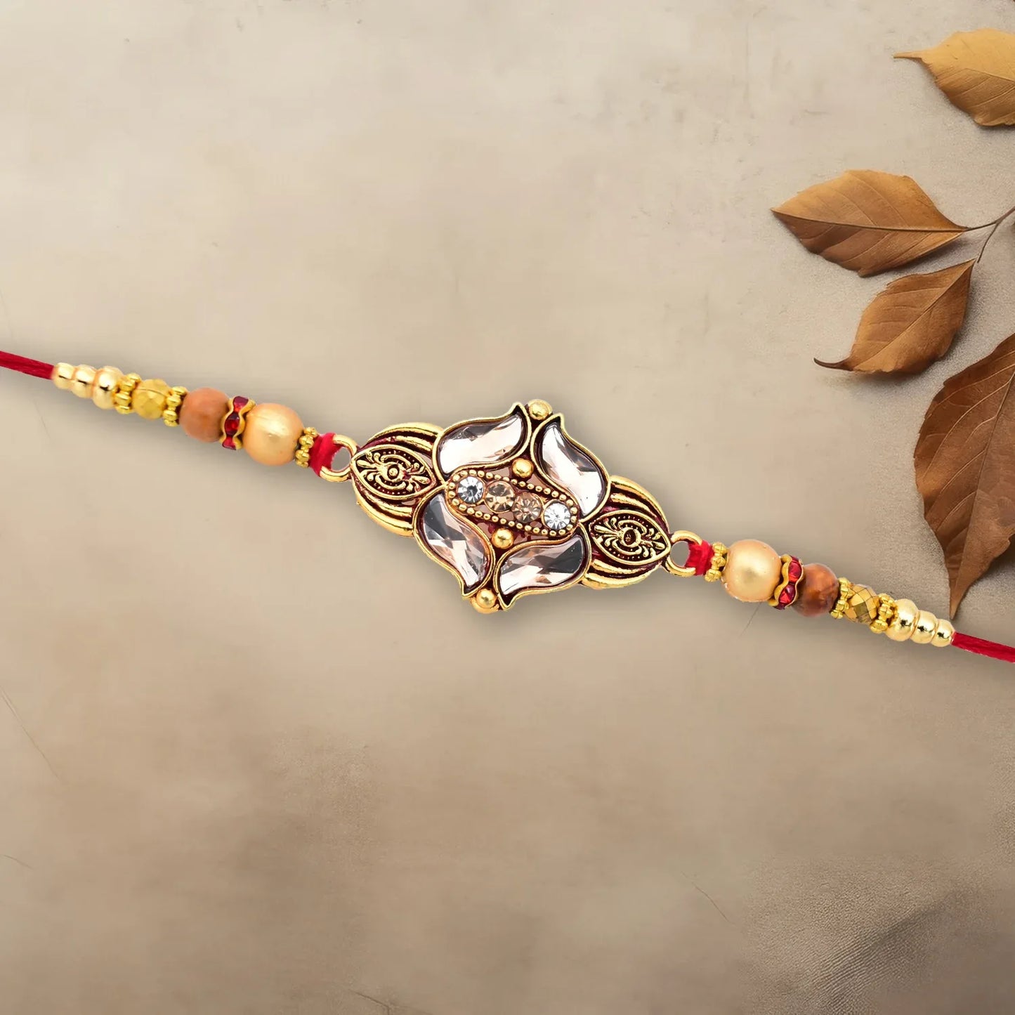 Elegant Floral Designer Rakhi With Gold-toned Beads Red Thread - warehousetech13