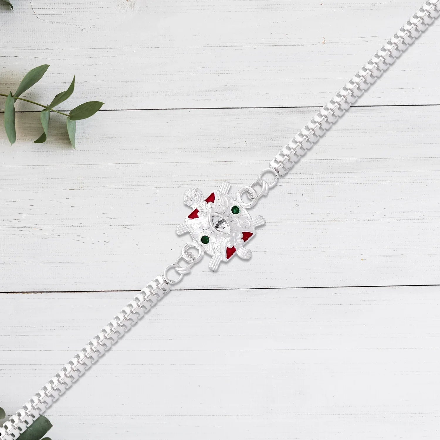 Designer Turtle Rakhi With Silver Finish And Enamel Highlights - warehousetech13