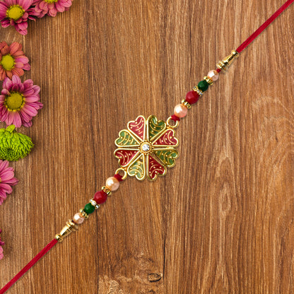 Traditional Kundan Rakhi With Golden Floral Base And Rudraksha Beads - warehousetech13