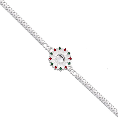 Elegant Silver-plated Floral Rakhi With Red And Green Meenakari Accents - warehousetech13