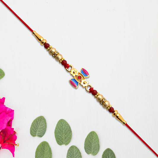 Damru Rakhi With Beads And Floral Detailing - warehousetech13
