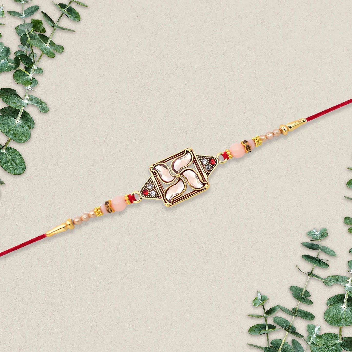 Designer Rakhi With Swastik-inspired Kundan Dial And Decorative Beads - warehousetech13