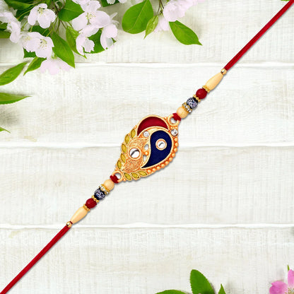 Elegant Rakhi With Enamel Paisley Design And Gold-tone Embellishments - warehousetech13
