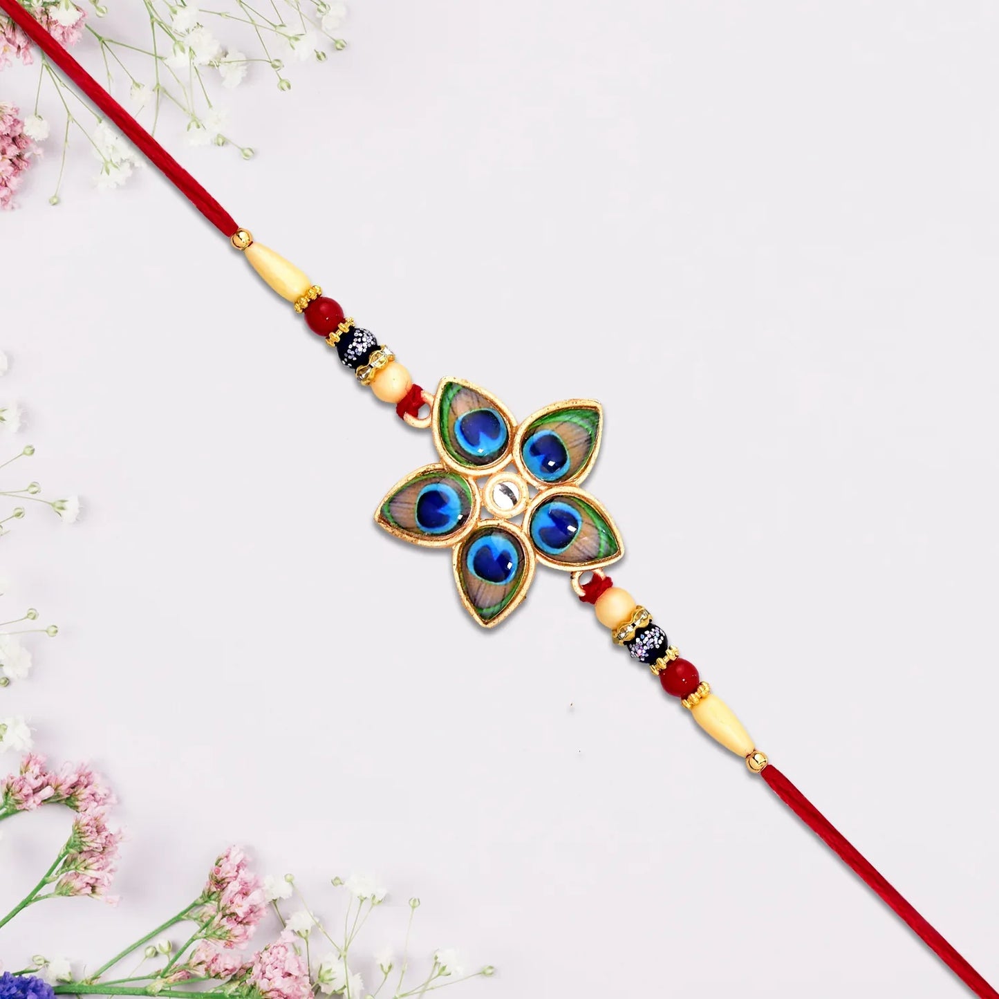 Designer Mor Pankh Rakhi In Star Shape - warehousetech13