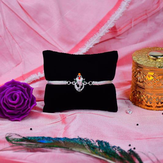 Stylish Ganesha Rakhi With Enamel Highlights And Silver Metal Chain - warehousetech13
