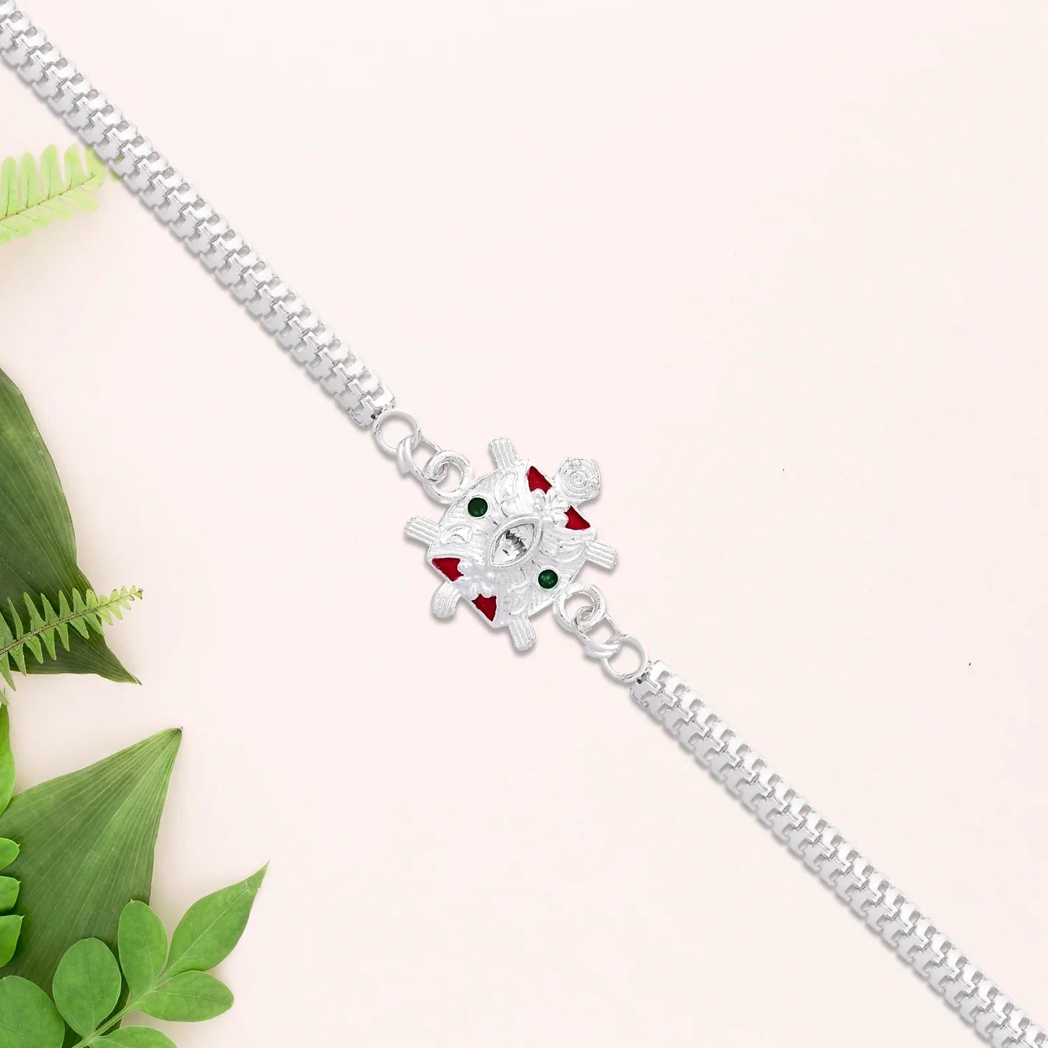 Designer Turtle Rakhi With Silver Finish And Enamel Highlights - warehousetech13