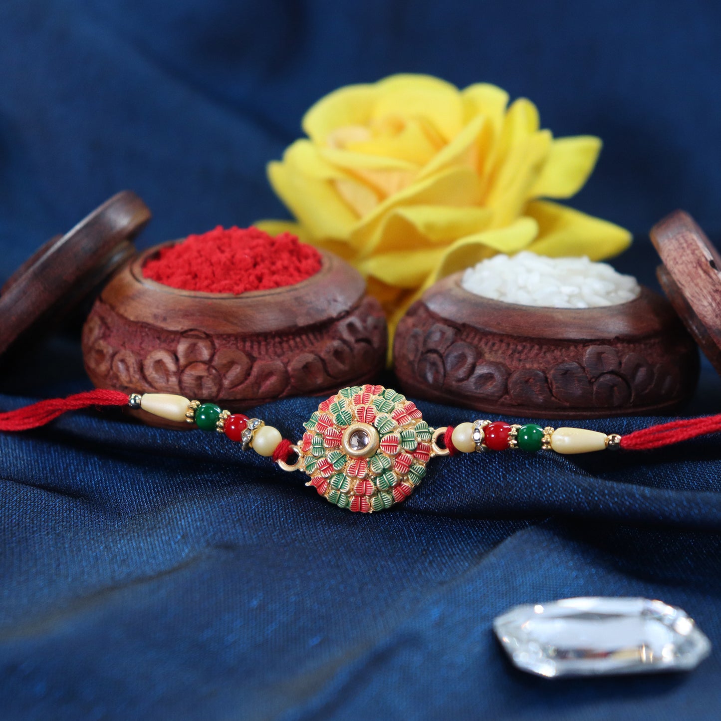 Traditional Kundan Rakhi With Golden Floral Base And Rudraksha Beads - warehousetech13