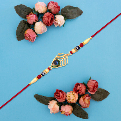 Peacock Feather Design Rakhi With Beaded Detailing And Red Thread - warehousetech13