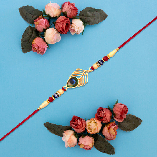 Peacock Feather Design Rakhi With Beaded Detailing And Red Thread - warehousetech13
