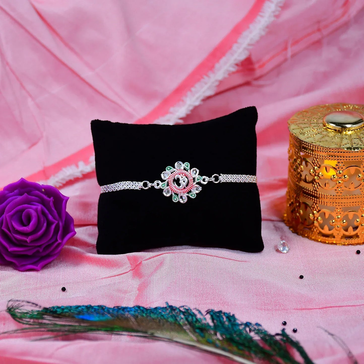 Elegant Floral Om Rakhi With Pink-green Accents - warehousetech13